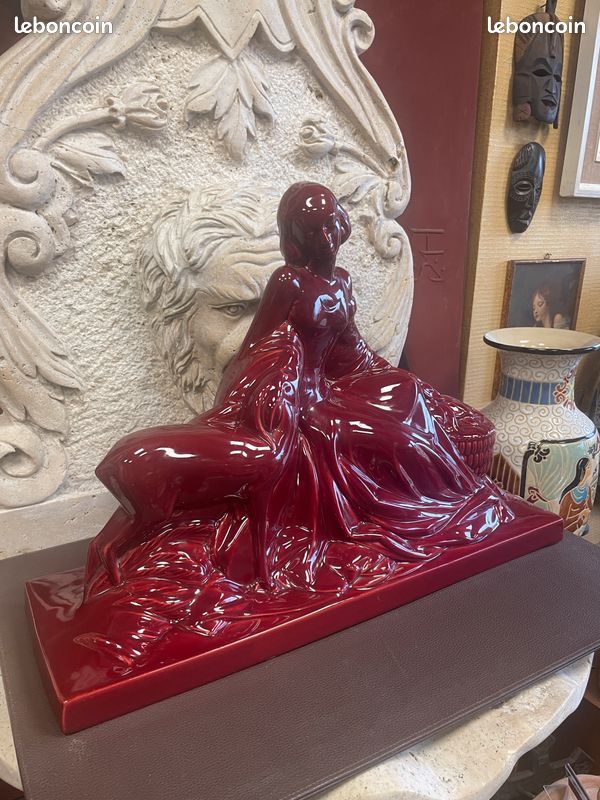 Ancienne céramique signé POLBERT. Femme et biche